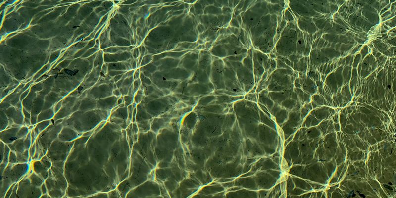 Abstract visualization of airflow or sound waves in a calm, flowing pattern.